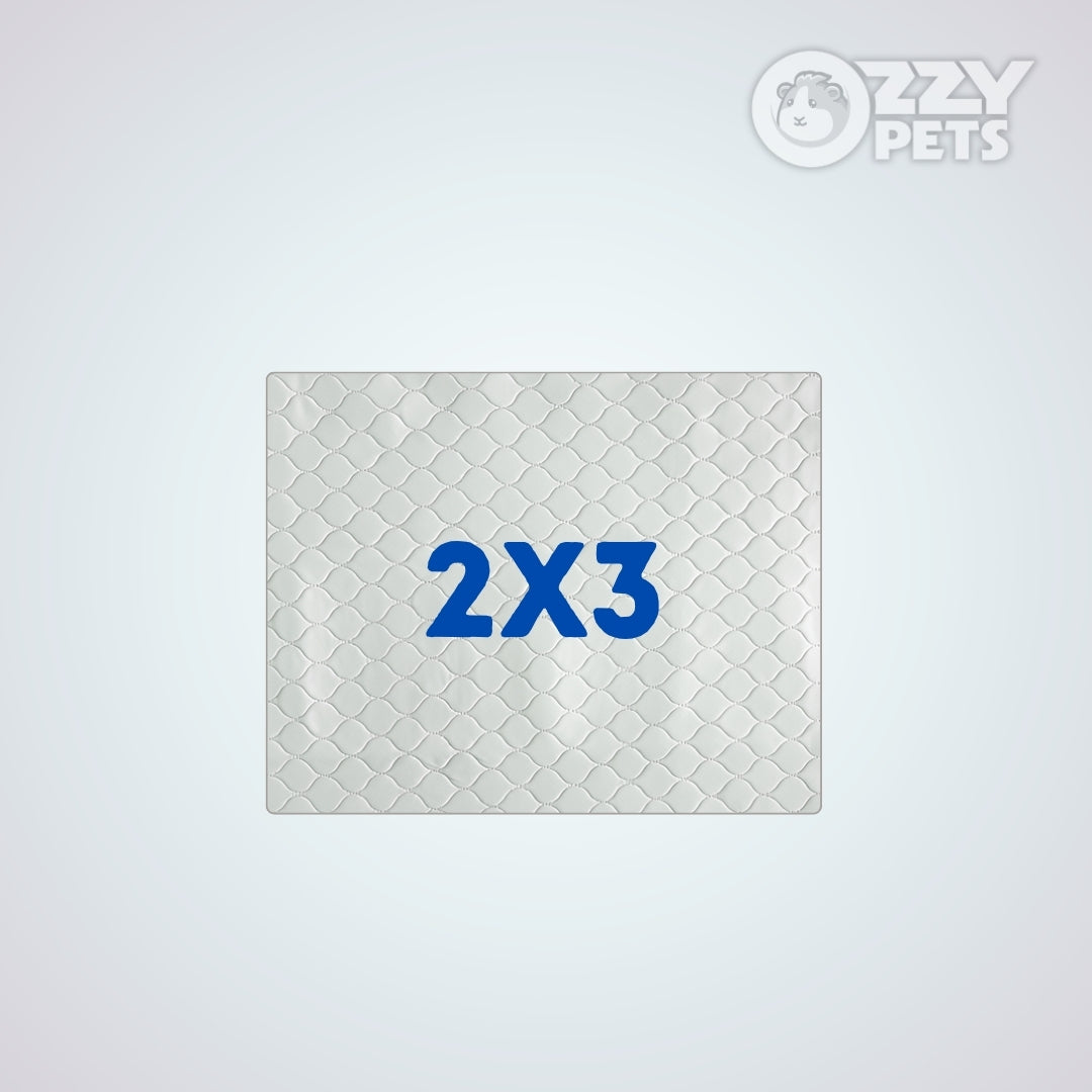 A square, light gray textured mat with a diamond pattern and the blue text '2X3' in the center, shown on a light gray background with an 'OZZY PETS' logo in the top right corner.