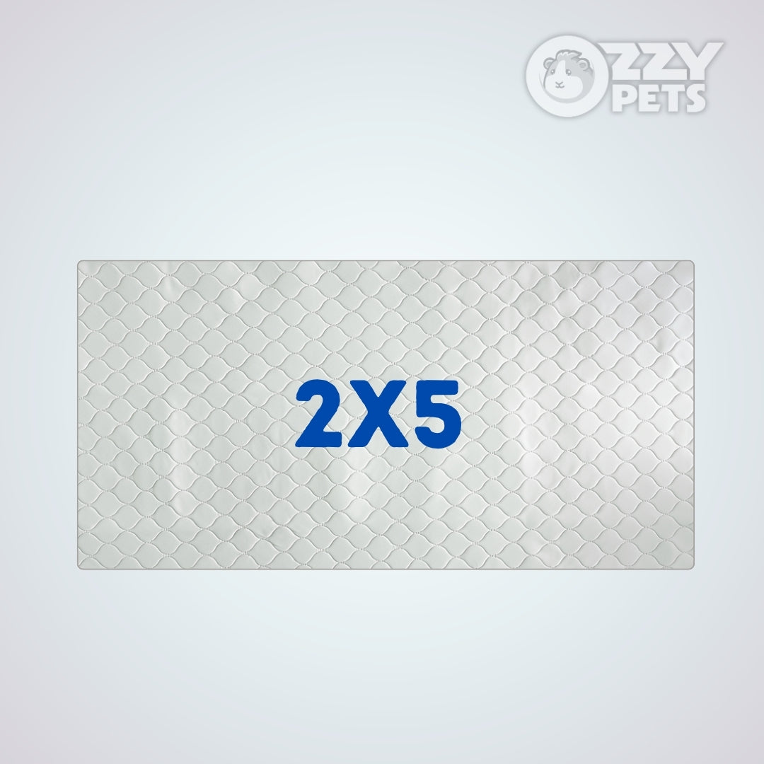 A rectangular pet mat with a raised diamond pattern in light gray, featuring the blue text '2X5' in the center. The OZZY PETS logo is visible in the top right corner.