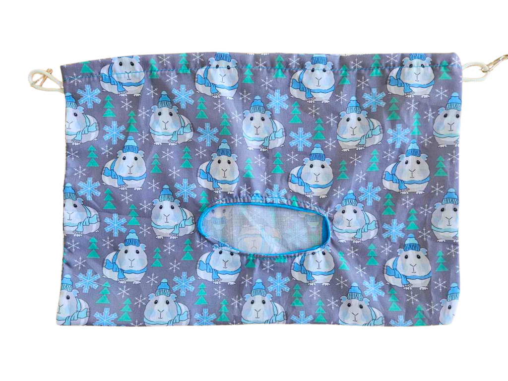 hay bag with blue winter guinea pig design